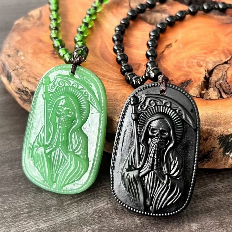 Santa Muerte Sculpture Dog Tag - đánh giá và giá Vintage Fashion Labels
