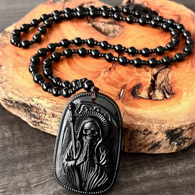 Santa Muerte Sculpture Dog Tag - đánh giá và giá Vintage Fashion Labels